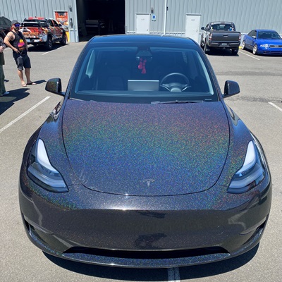 Tesla Model Y Wrap in Galactic Gold Vinyl